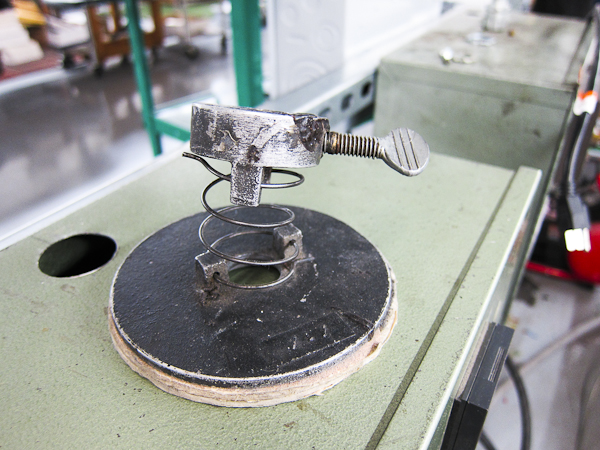 springy things inside a letterpress print shop