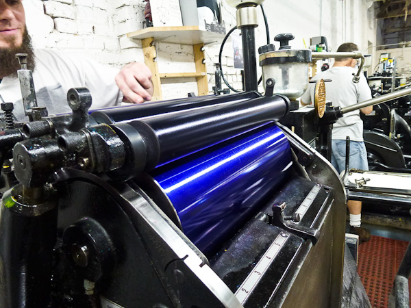 an up close shot of letterpress printers at boxcar press