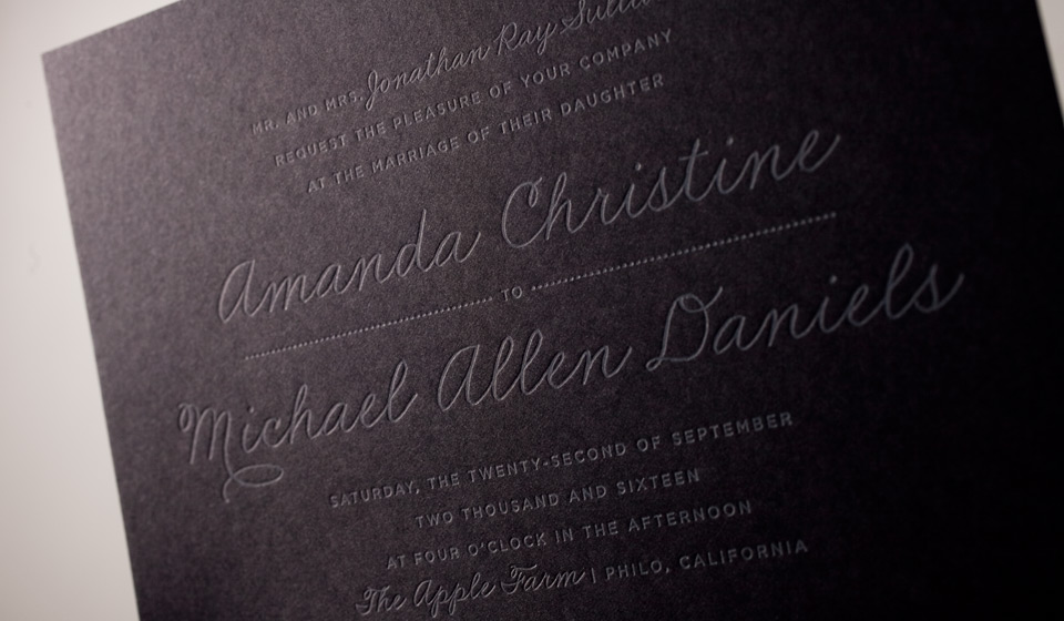 photo of light ink on dark paper