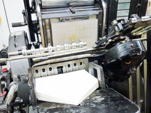 Envelopes stacked in a letterpress printer