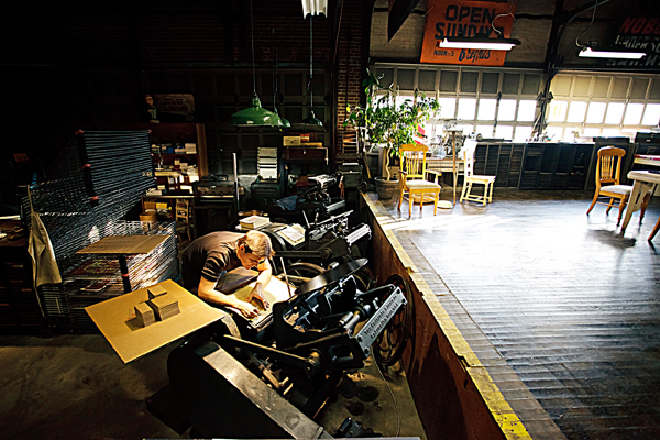 John Reburn of Appalachia Press pores over his letterpress designs